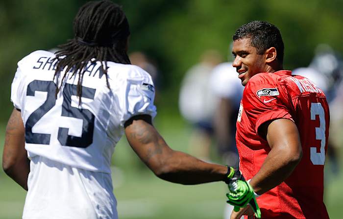 In two seasons together, Richard Sherman and Russell Wilson have led the Seahawks to a 24-8 record in the regular season. (Ted S. Warren/AP)